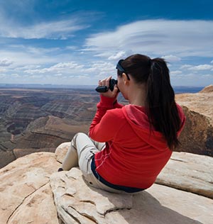 women taking video of Grand Canyon